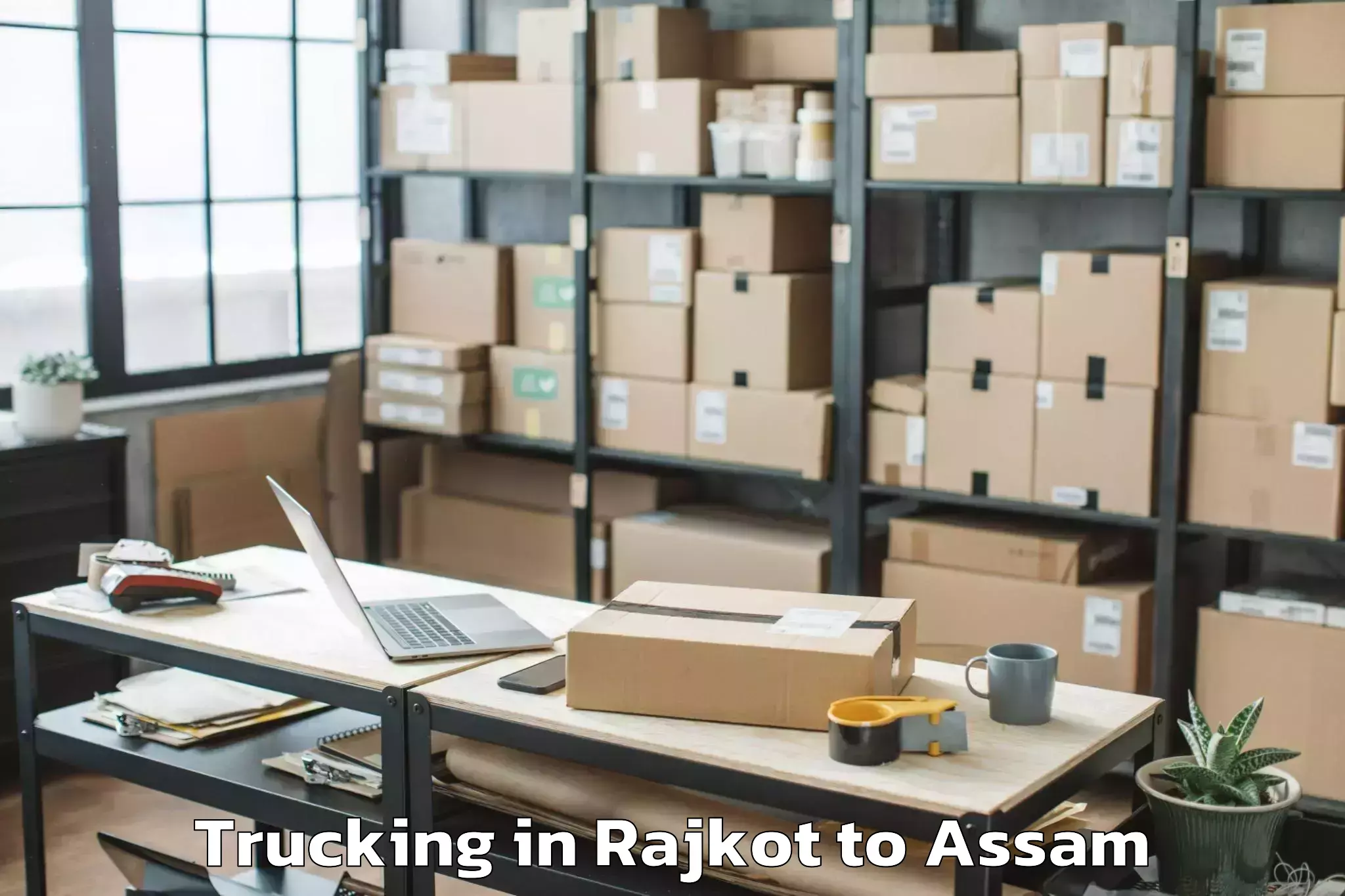 Affordable Rajkot to Jamuguri Trucking